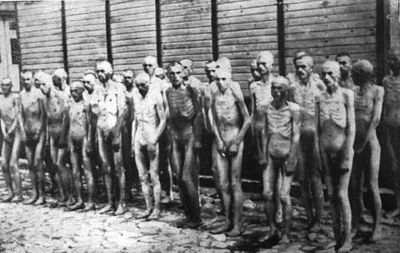 Soviet prisoners of war standing before barracks in Mauthausen Concentration Camp, Austria, black-and-white photograph, date unknown [ca. 1941–1945], unknown photographer; source: Deutsches Bundesarchiv (German Federal Archive), Bild 192-208, Wikimedia Commons, http://commons.wikimedia.org/wiki/File:Bundesarchiv_Bild_192-208,_KZ_Mauthausen,_Sowjetische_Kriegsgefangene.jpg?uselang=de.Creative Commons Attribution-Share Alike 3.0 Germany license. 